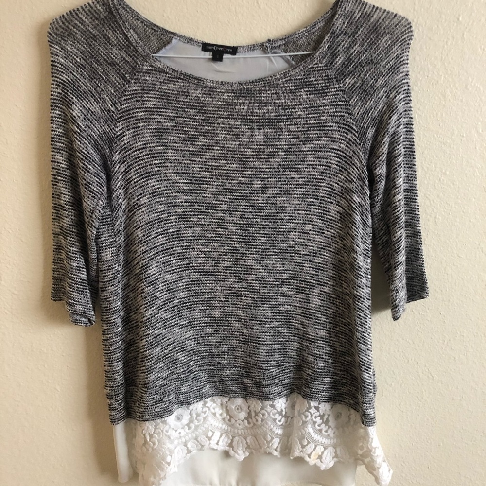 Black and whit shirt with lace.